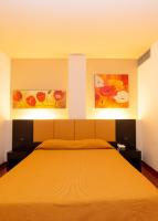 A bed or beds in a room at Victoria Terme Hotel