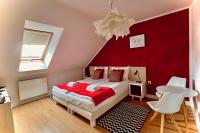 Łóżko lub łóżka w pokoju w obiekcie Hotel77