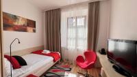Telewizja i/lub zestaw kina domowego w obiekcie Hotel77