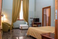 A bed or beds in a room at Le Stanze Del Vicerè Boutique Hotel