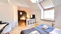 Łóżko lub łóżka w pokoju w obiekcie Hotel77