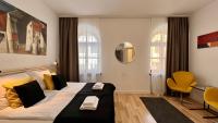 Łóżko lub łóżka w pokoju w obiekcie Hotel77