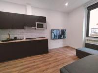 Kuchyň nebo kuchyňský kout v ubytování Apartamentos Margarita by gaiarooms
