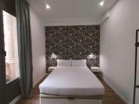 Postel nebo postele na pokoji v ubytování Apartamentos Margarita by gaiarooms
