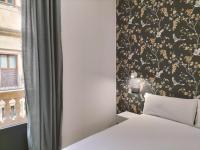 Postel nebo postele na pokoji v ubytování Apartamentos Margarita by gaiarooms