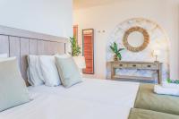 Posteľ alebo postele v izbe v ubytovaní Boutique Beach Villa by Lanzarote Retreats - Private Pool - 1 min walk to Sea Pool