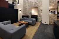 Posezení v ubytování American Loft in the Heart of Prague