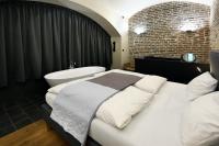 Postel nebo postele na pokoji v ubytování American Loft in the Heart of Prague