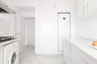 Kuchyňa alebo kuchynka v ubytovaní Suites Maestranza - Puerta del Arenal by Magno Apartments