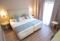 A bed or beds in a room at Alborán Algeciras