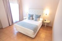 A bed or beds in a room at Alborán Algeciras