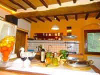 A kitchen or kitchenette at Ex-mulino Pontevecchio (mill on the river)