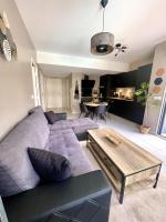 Posedenie v ubytovaní Très bel appartement dans résidence avec piscine à 5min des plages de Villeneuve Loubet.