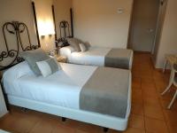 A bed or beds in a room at Alborán Algeciras