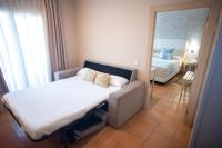 A bed or beds in a room at Alborán Algeciras
