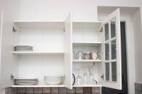 A kitchen or kitchenette at Broadway Apartments B1