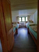 Postel nebo postele na pokoji v ubytování Steinhaus / Kamenny Dum