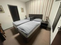 Postel nebo postele na pokoji v ubytování Apartmán Ateliér