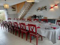 Un restaurant u otro lugar para comer en Le Clos des Pommiers