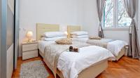 Posteľ alebo postele v izbe v ubytovaní Palomar Luxury Apartment Split