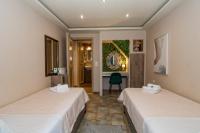 A bed or beds in a room at Star Jasmine House Acharavi