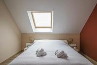 Łóżko lub łóżka w pokoju w obiekcie Kokana modern holiday home