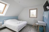 Łóżko lub łóżka w pokoju w obiekcie Kokana modern holiday home