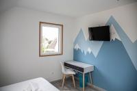Telewizja i/lub zestaw kina domowego w obiekcie Kokana modern holiday home