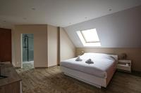 Łóżko lub łóżka w pokoju w obiekcie Kokana modern holiday home