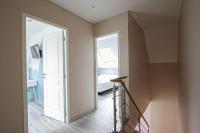 Telewizja i/lub zestaw kina domowego w obiekcie Kokana modern holiday home