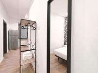 Postel nebo postele na pokoji v ubytování Apartamentos Margarita by gaiarooms