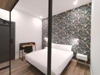 Postel nebo postele na pokoji v ubytování Apartamentos Margarita by gaiarooms