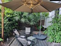 Un patio o zona al aire libre en Luxueux appartement 4 personnes - Parking gratuit - 20 min de Paris