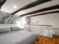 A bed or beds in a room at Enjoy Naples