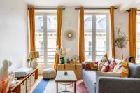 A seating area at Superbe appartement au c&oelig;ur de Paris - Marais