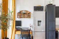 A kitchen or kitchenette at Superbe appartement au c&oelig;ur de Paris - Marais