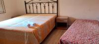 Posteľ alebo postele v izbe v ubytovaní Casa Vacanze dalla Nonnina