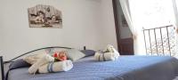 Posteľ alebo postele v izbe v ubytovaní Casa Vacanze dalla Nonnina