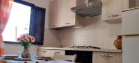 Kuchyňa alebo kuchynka v ubytovaní Casa Vacanze dalla Nonnina