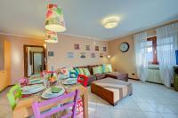 A seating area at Casa Angiolina Lake And Mountain View - Happy Rentals