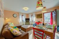 A seating area at Casa Angiolina Lake And Mountain View - Happy Rentals