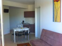 Kuchyň nebo kuchyňský kout v ubytování Fantasia Hotel Apartments