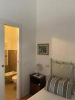 A bed or beds in a room at B&B Villa il Poggetto