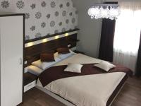 Posteľ alebo postele v izbe v ubytovaní Guesthouse Villa Plitvička