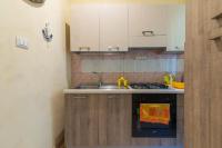 A kitchen or kitchenette at Eracles House near Ortigia Island