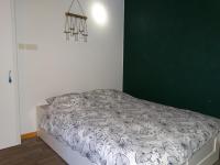 Posteľ alebo postele v izbe v ubytovaní Grand appartement paisible et confortable