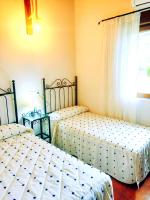 Postel nebo postele na pokoji v ubytování La Casita De La Montaña