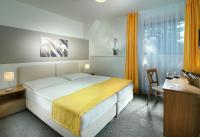 Postel nebo postele na pokoji v ubytování Hotel VZ Bedřichov