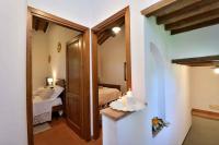 A bed or beds in a room at Holiday home in Villamagna - Toskana 44123