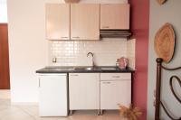 Kuchyňa alebo kuchynka v ubytovaní Boho House Florina